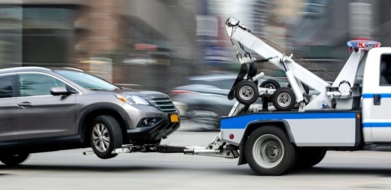 Two truck from 24-hour towing service towing crossover SUV in Lehigh Valley, Pennsylvania